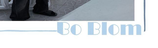 Detail: the artist name Bo Blom in pale blue